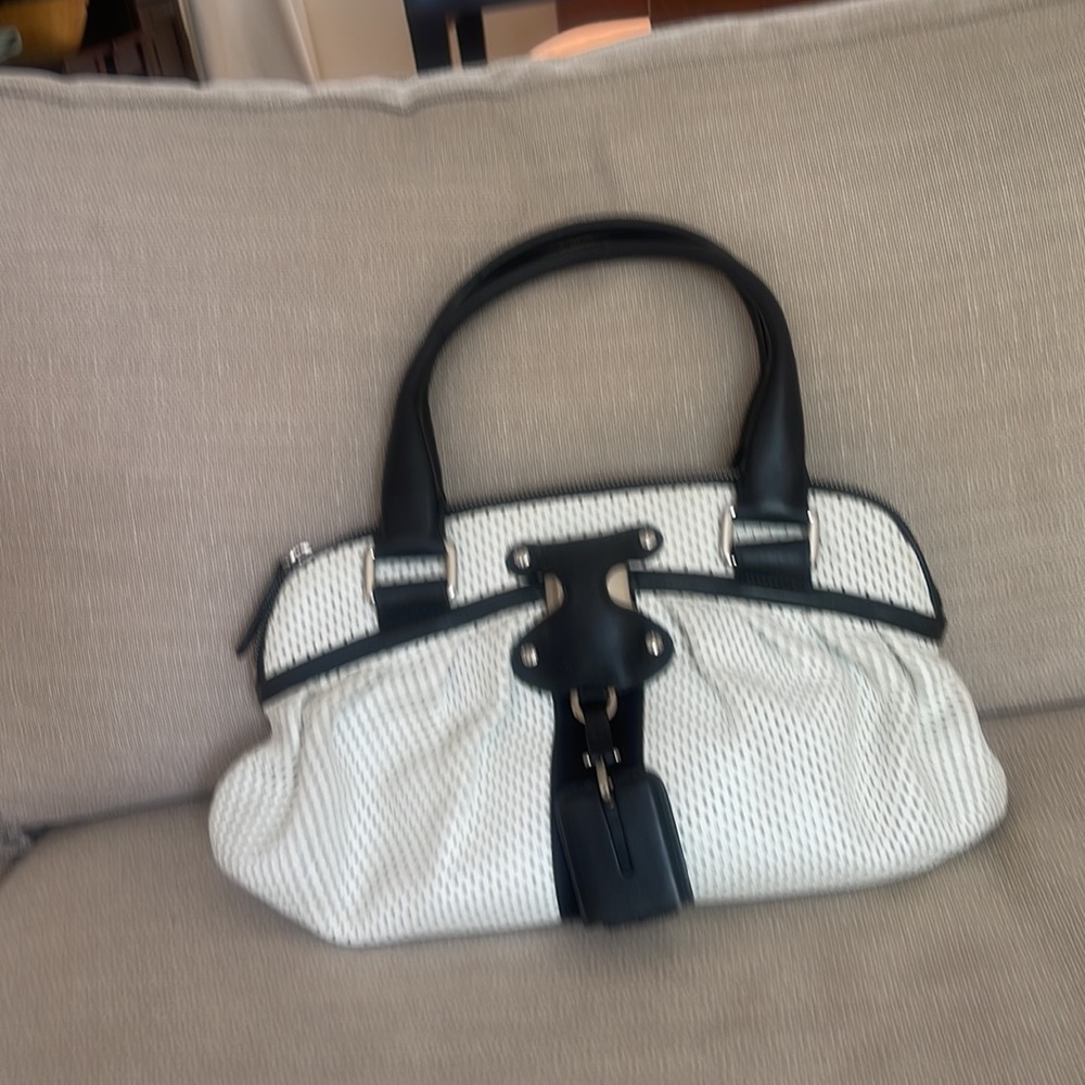 Hugo Boss. Originally Casual bag. LEATHERS , light, comfortable handles